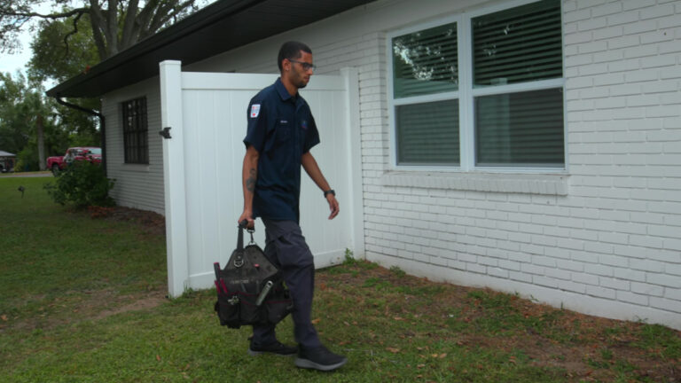 Custom air conditioning and air quality technician on the job