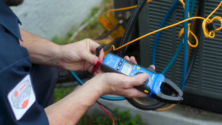 Diagnostic tools being used on an HVAC unit